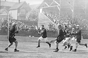 A clash of titans, as diminutive goalkeeper ‘Bun’ Clark comes up for the save against Vancouver in 1912 - the player in white shorts leading the Greenshirts’ charge is Édouard ‘Newsy’ Lalonde, Canada’s greatest lacrosse player from 1900-1950.