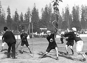‘Bun’ Clark defends the New Westminster goal against Vancouver sniper ‘Bones’ Allen (#9) at Hastings Park, ca. 1913. 