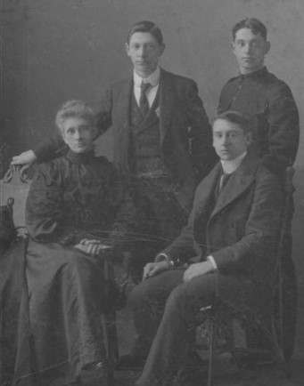 Cliff Cao (seated) with his mother Ada and two brothers Rico and Chris, ca. 1905-1910.